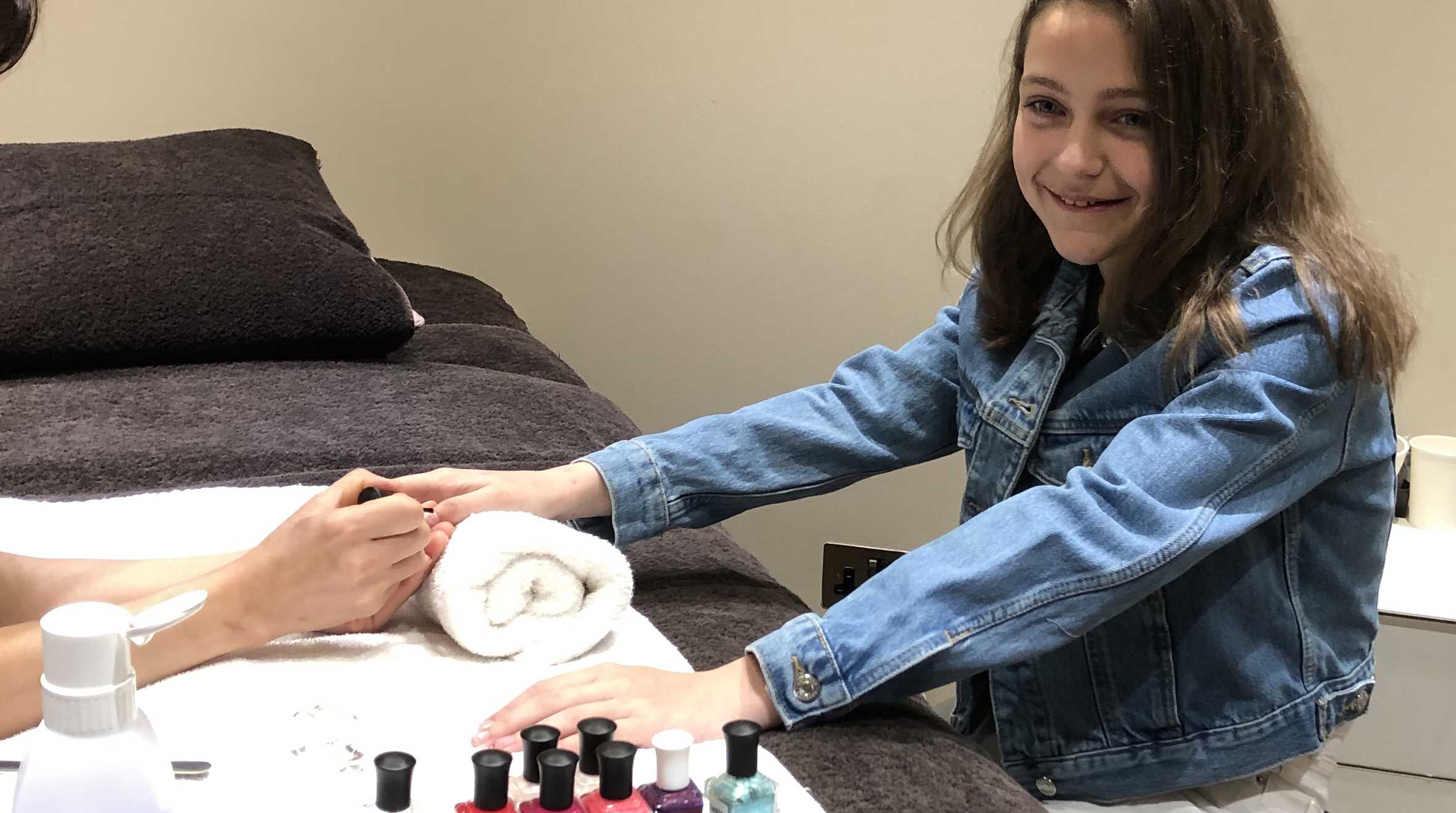 Meadow having her nail done