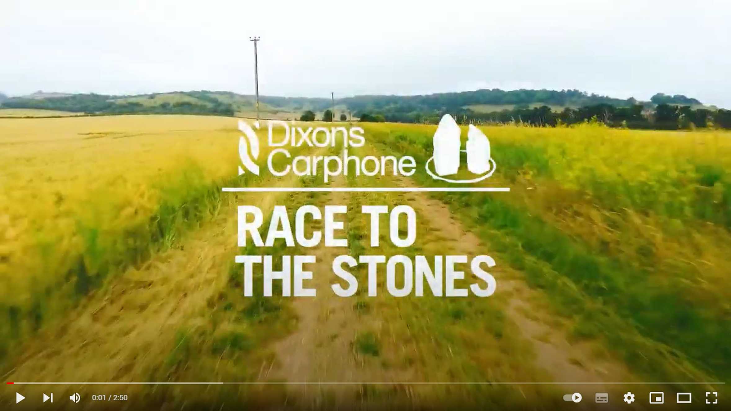 An opening card for a Race to the Stones video, with the Race to the Stones logo overlaid onto an image of a track through a field.