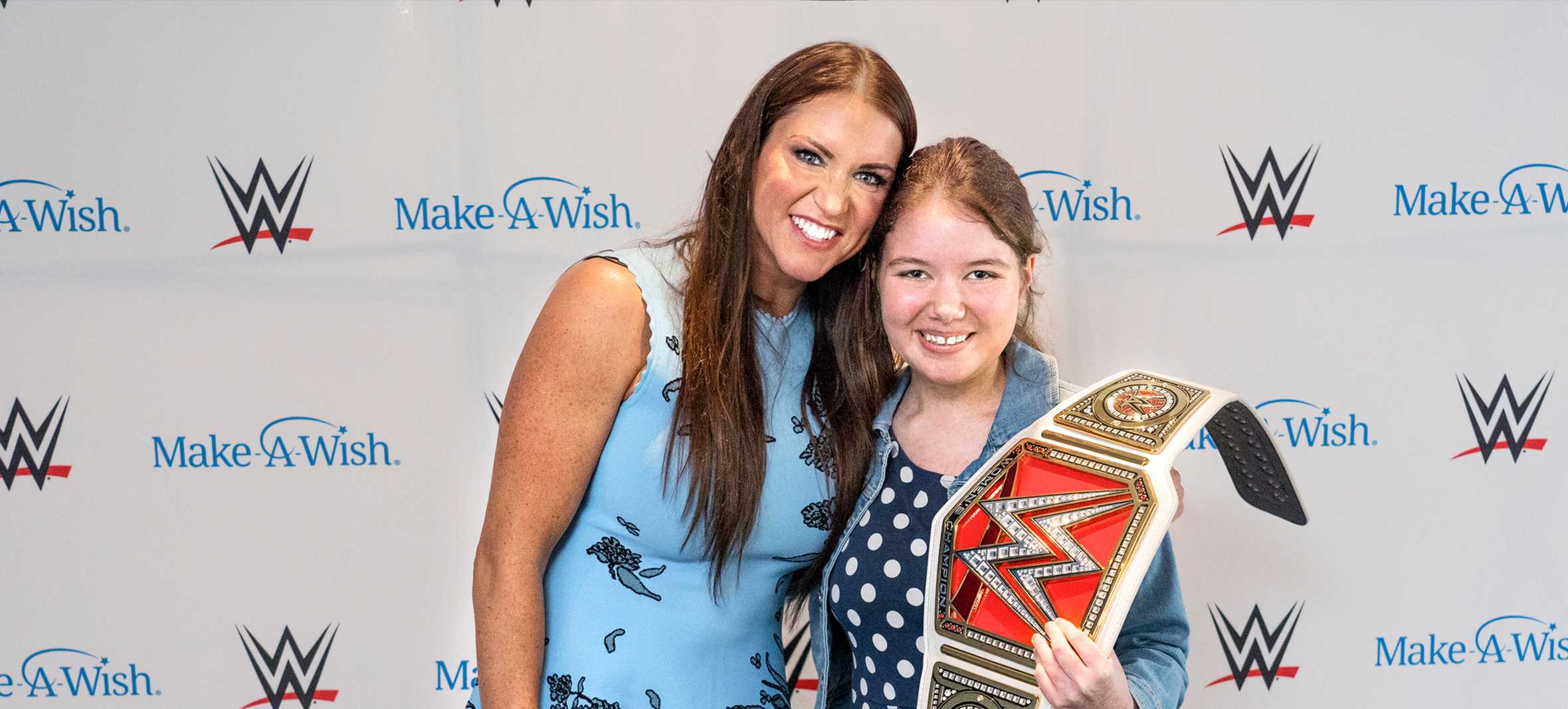 Rhianna with Stephanie and her wrestling belt