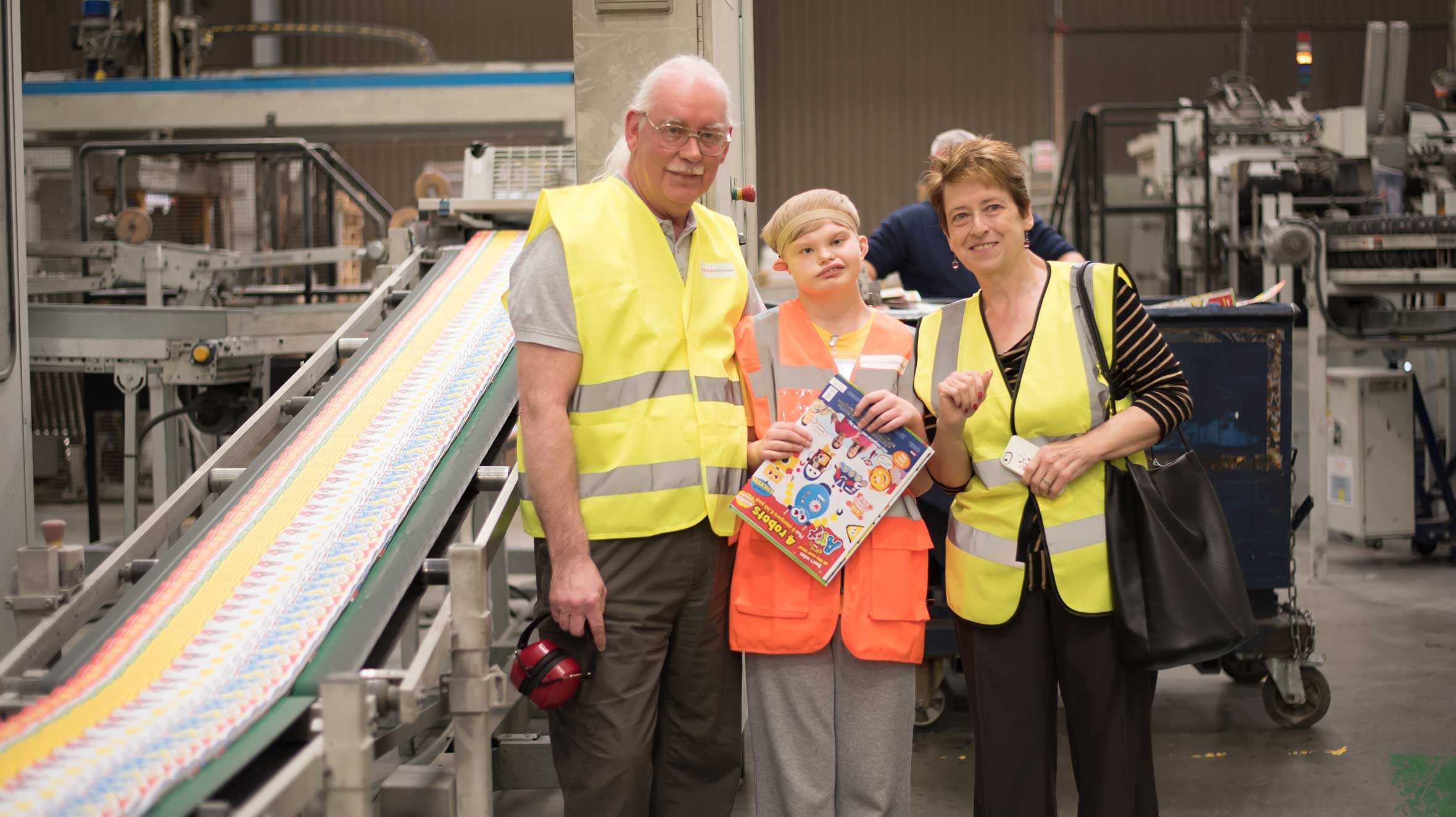 George with his mum and one of the employees