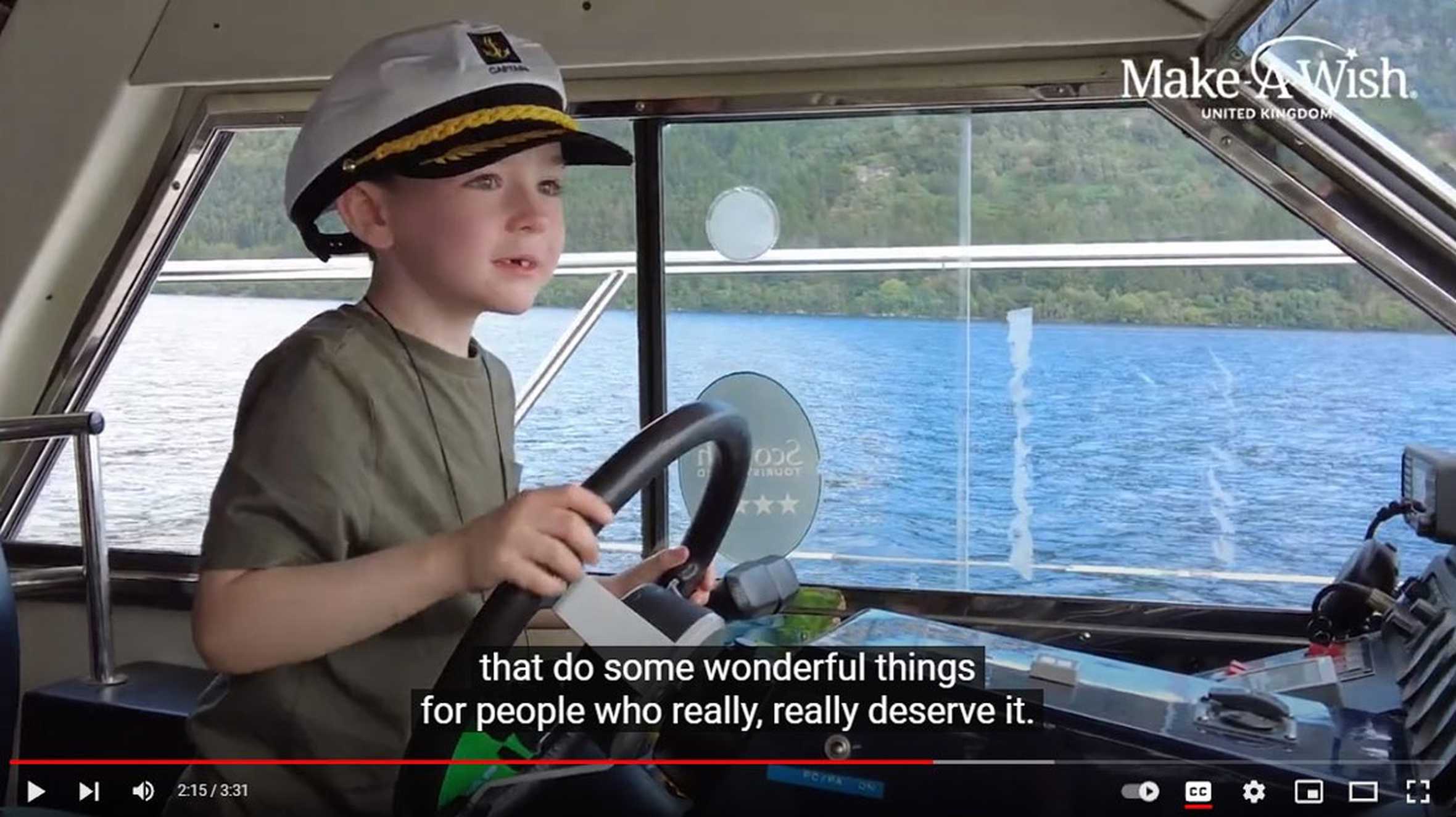 A still taken from the video of Harry's wish, showing Harry piloting the boat.