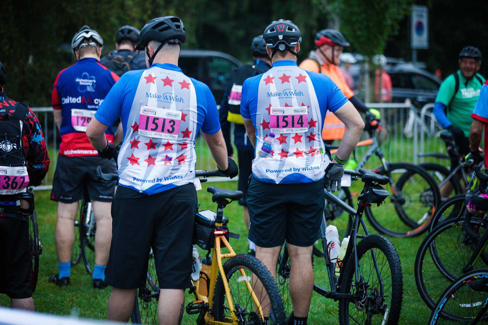 A rear view of two #WishHeroes getting ready to take part in the 2021 London to Brighton Cycle challenge.