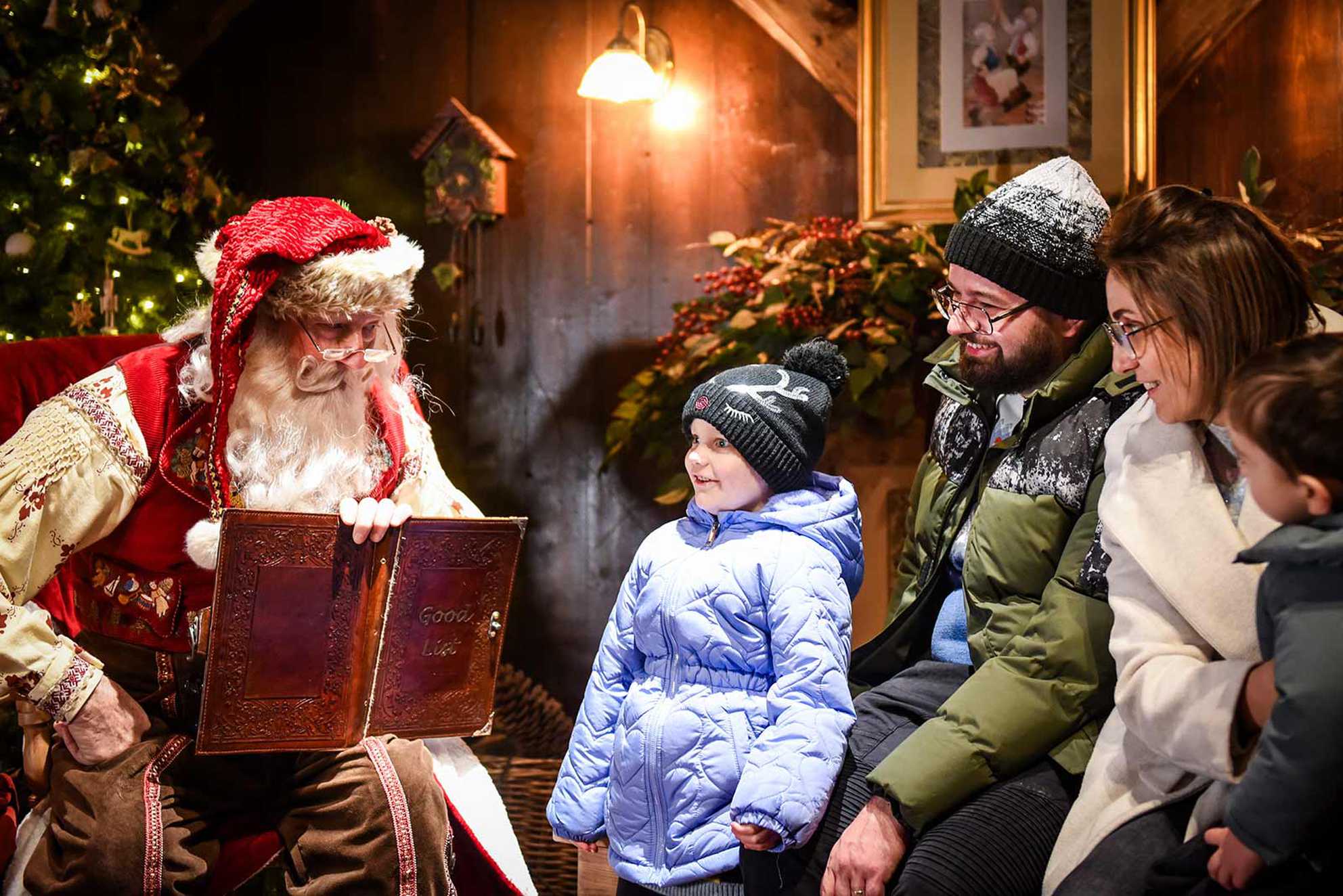 Julia and her family talking to Santa at Lapland UK.