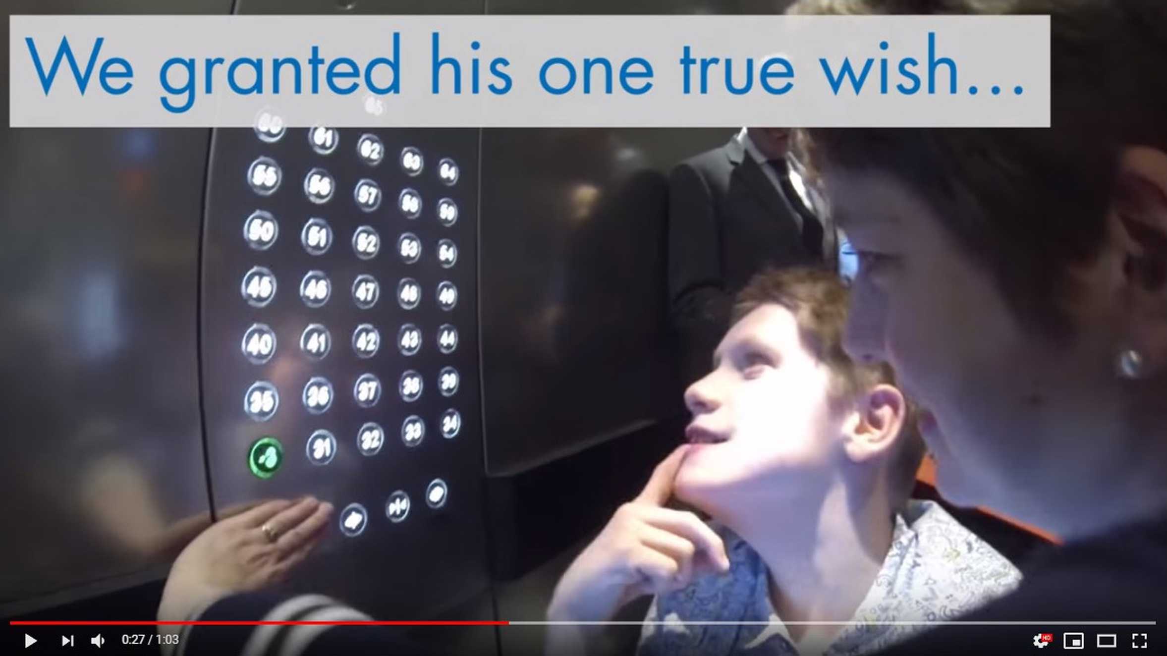 Wish child, James choosing which floor to go to on his wish to be a lift operator.