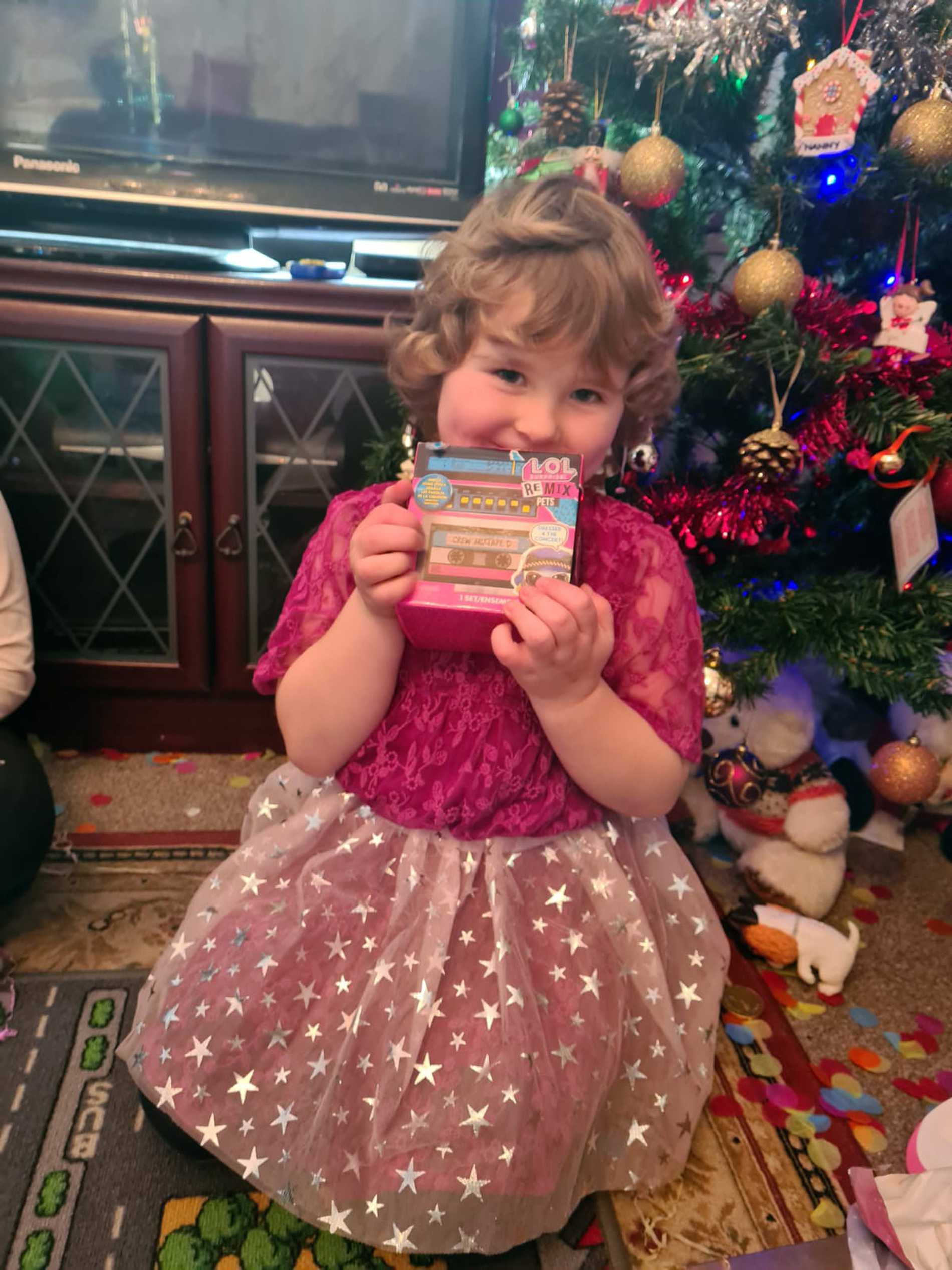 Leah opening one of her birthday presents.