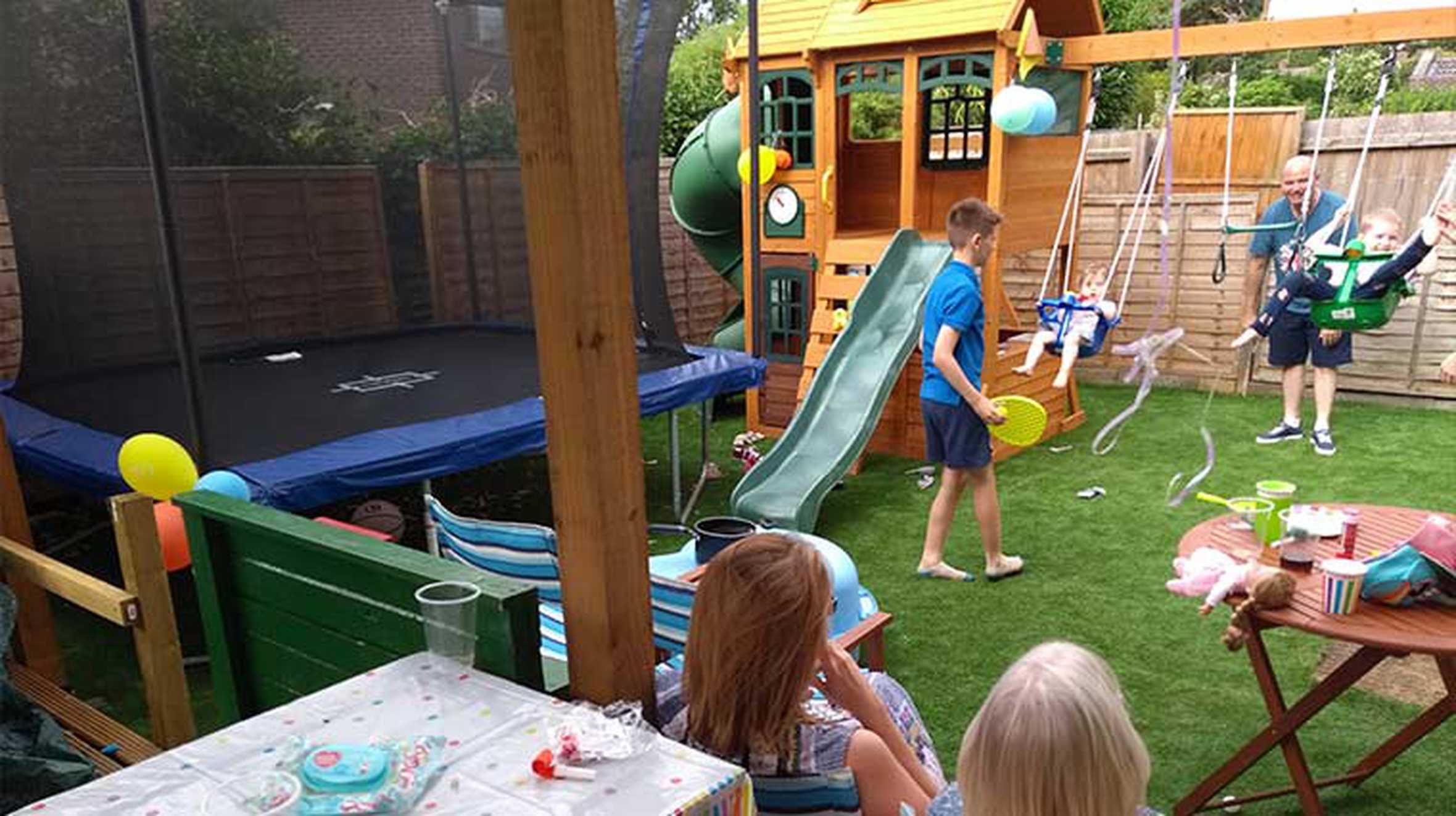 Mia's family enjoying their playset