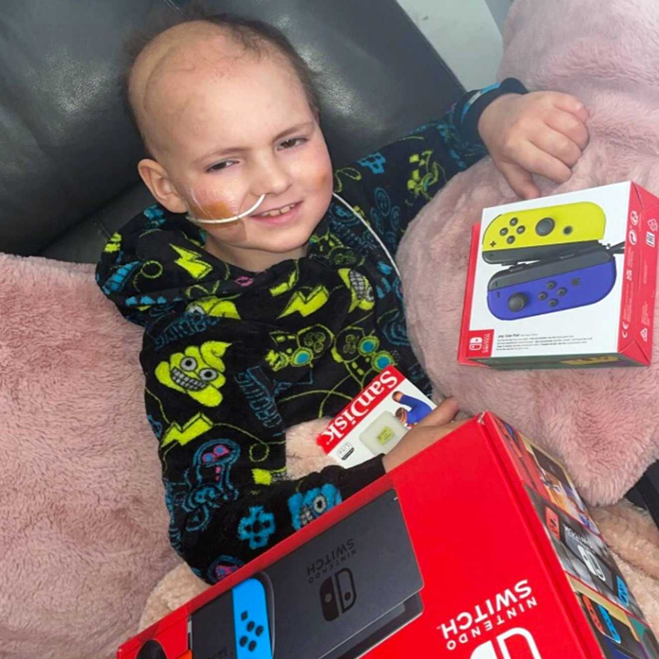 Wish child Leo with his new Nintendo Switch.