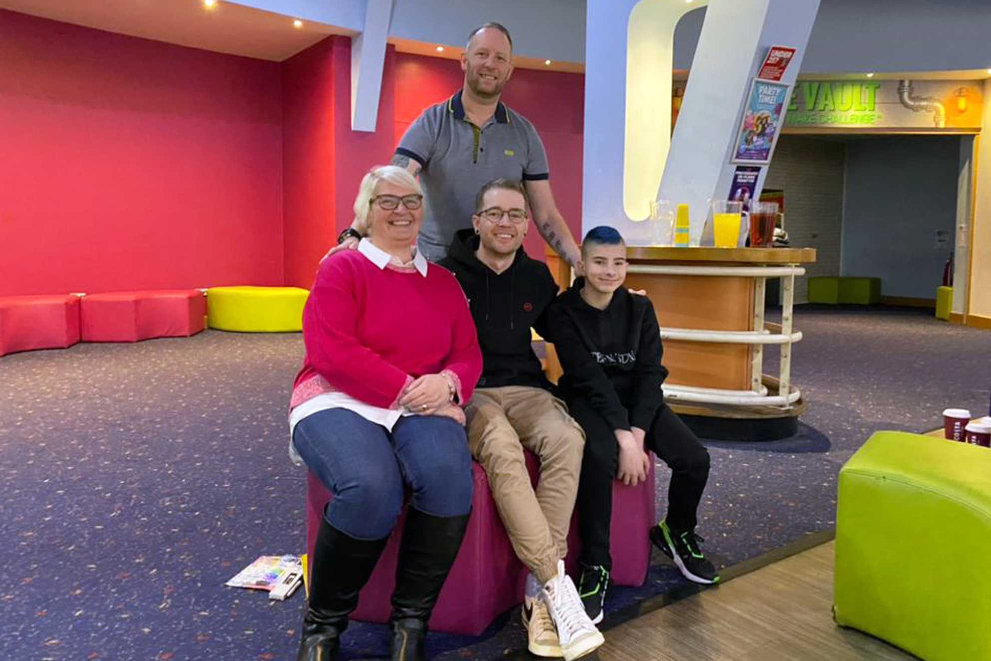 Connor and his mum and dad with YouTuber, DanTDM.