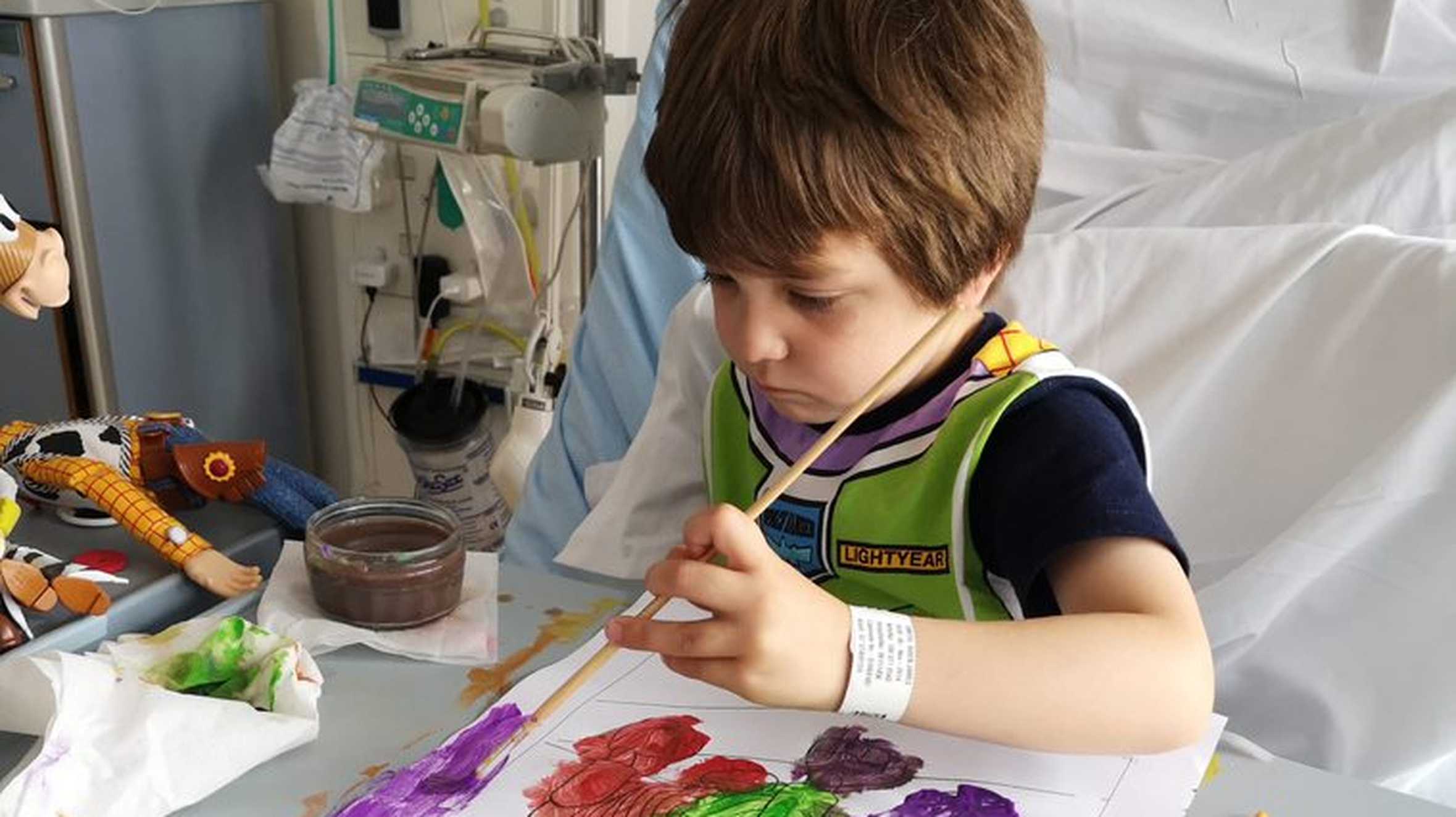 Wish child, Aiden painting while in hospital.